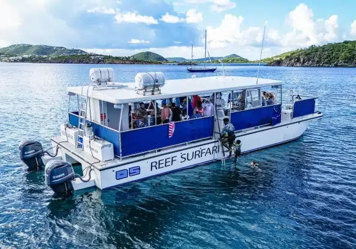 Snorkelers Returning To Boat 1920